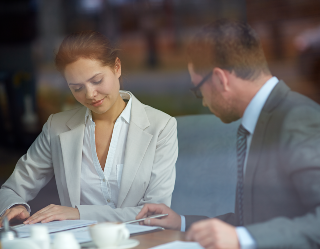 Man and Woman in a business meeting